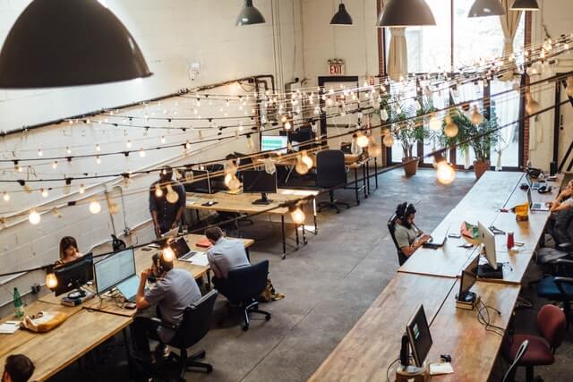 A scene of an office with people at work.