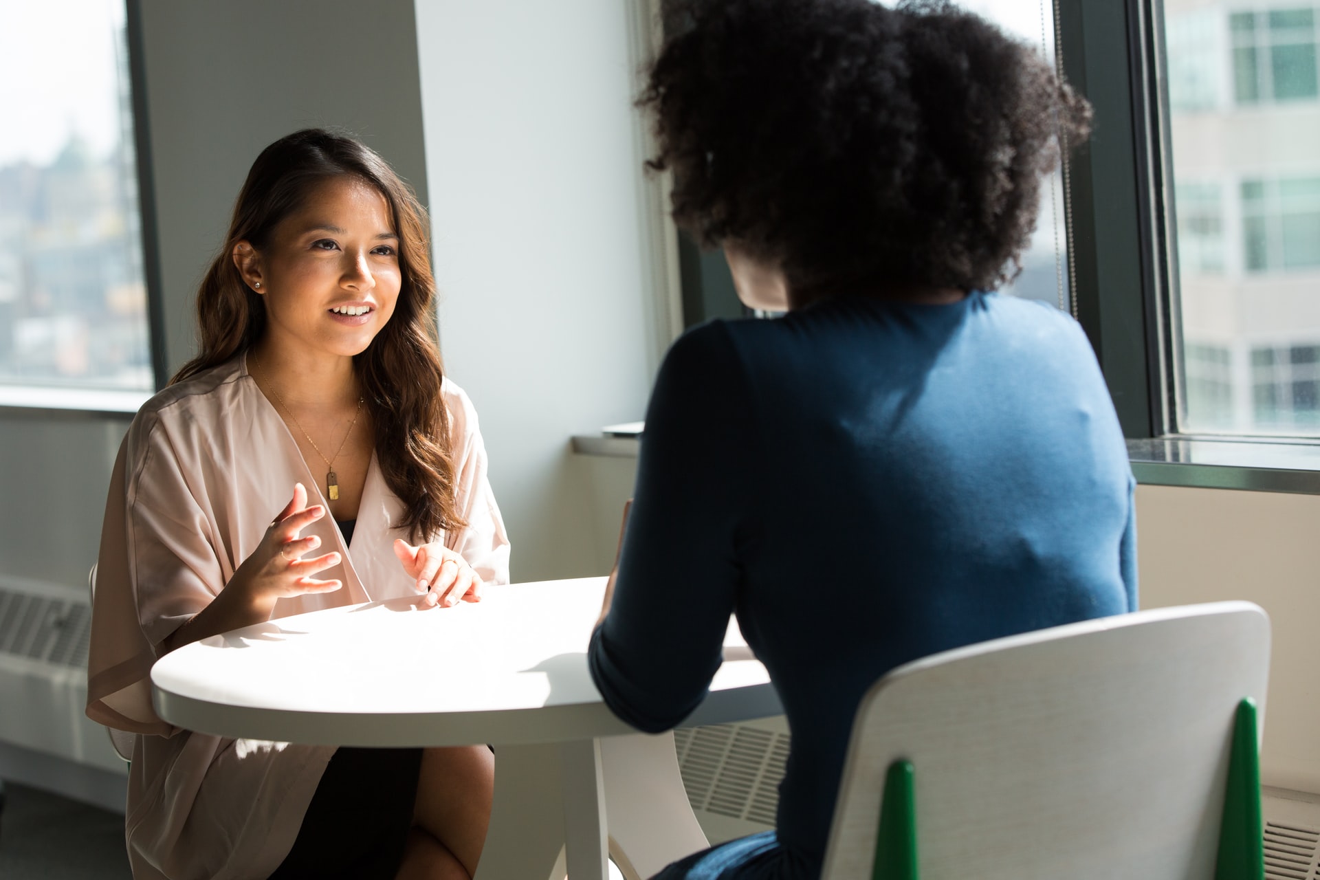 Two women in an interview.