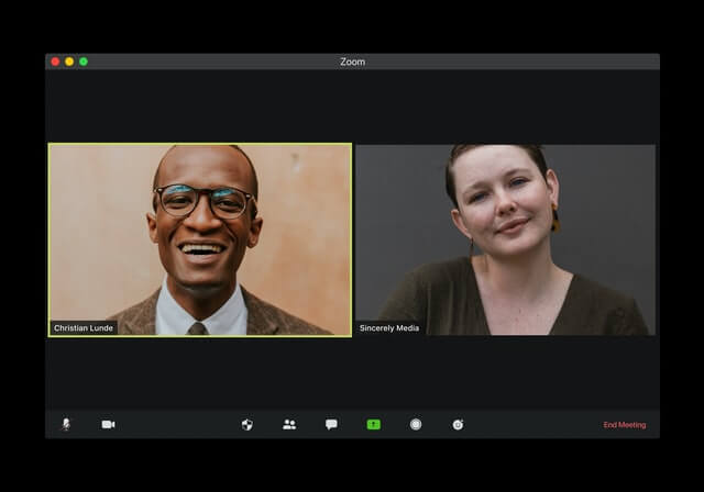 A man and woman have a video chat.