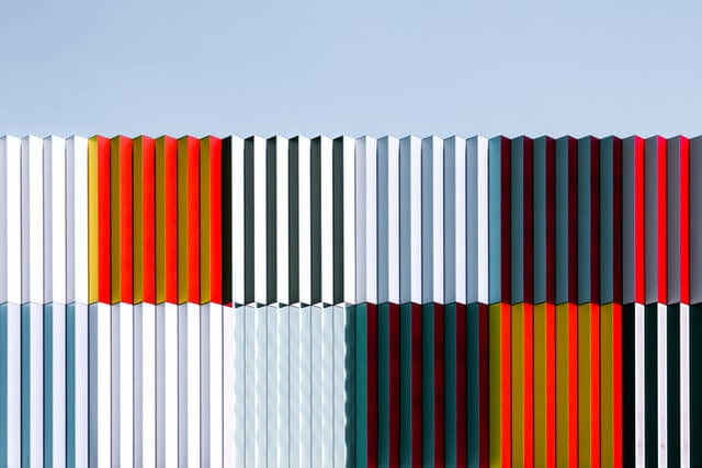 Several different colors of corrugated sheets