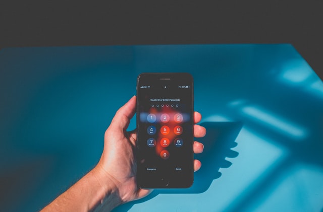 The keypad of a black iPhone.