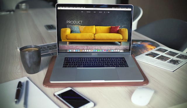 A product page on a website displayed on a laptop.