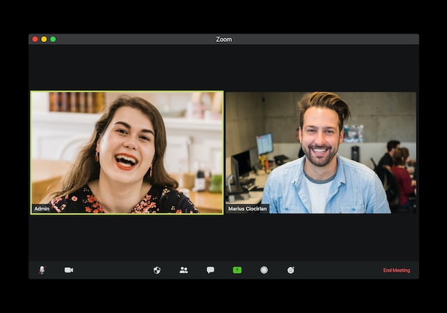 Two people engage in a video interview in an on-screen shot.