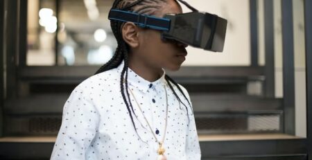 An individual wears a VR headset, spending time in the metaverse.