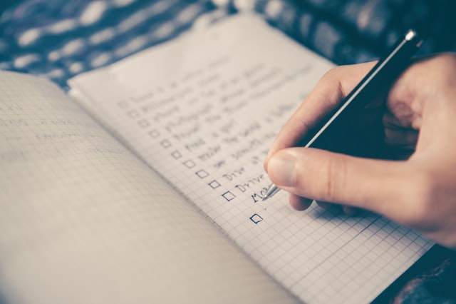 A checklist in a notebook. 