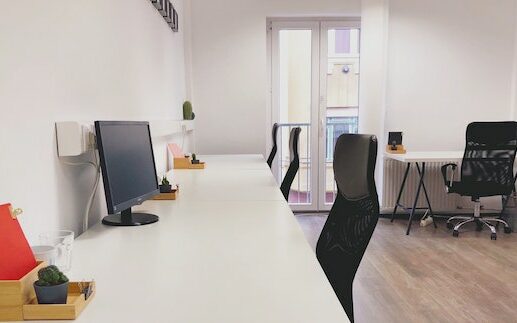 black office chair and white table