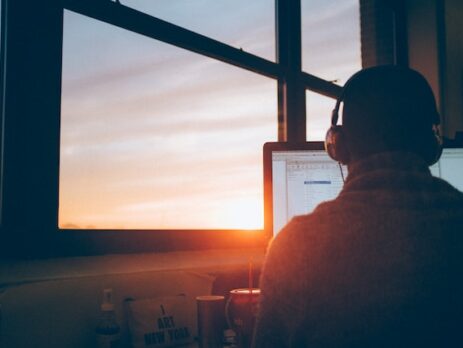 A man working remotely on his computer.