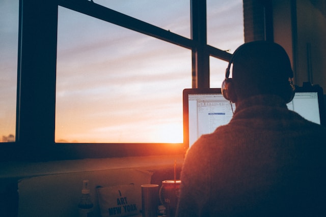 A man working remotely on his computer.