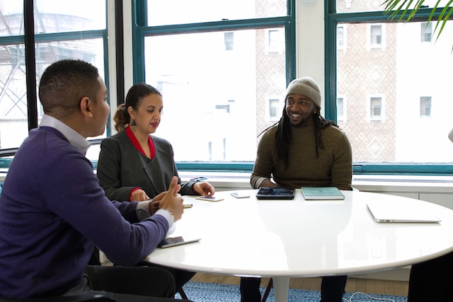 A group of people in an office.