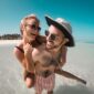 A couple on summer vacation together.