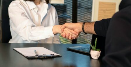 Two people shaking hands