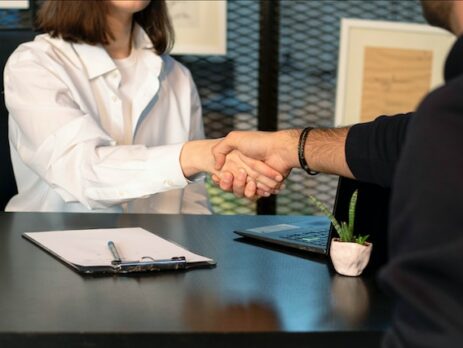 Two people shaking hands