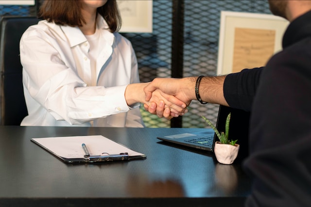 Two people shaking hands