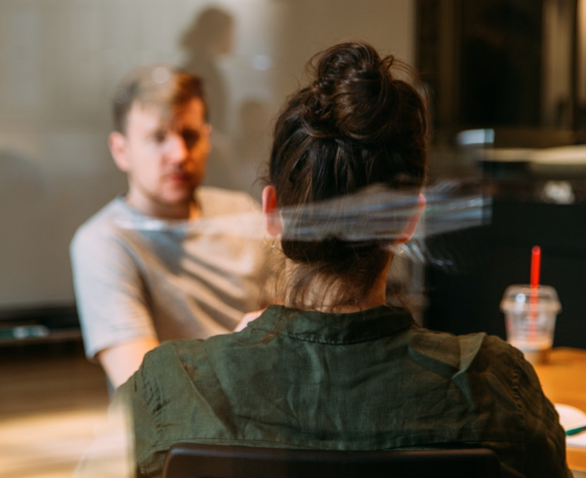 A man and woman having a meeting