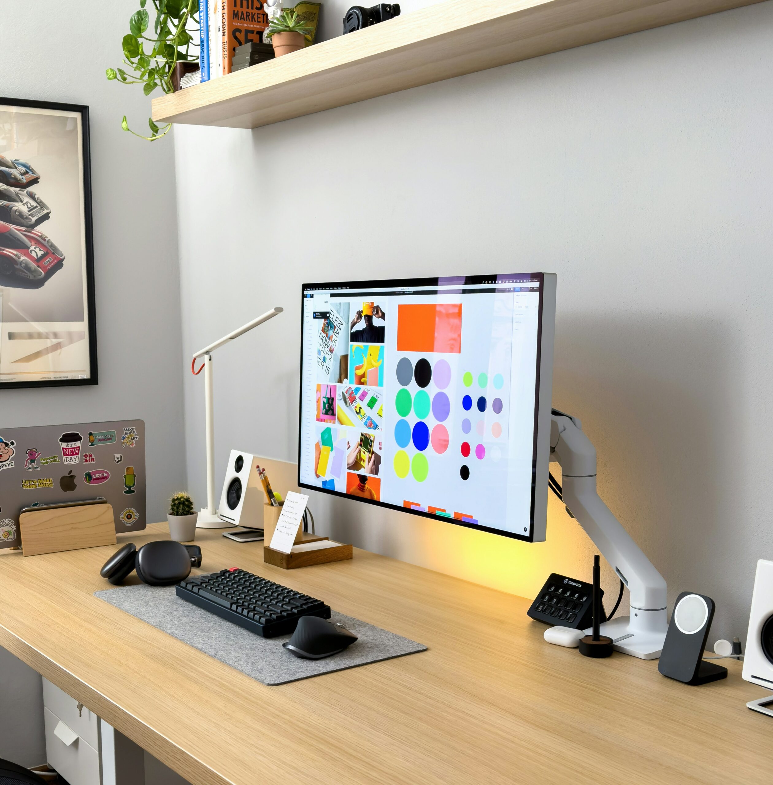 A computer sitting on top of a wooden desk