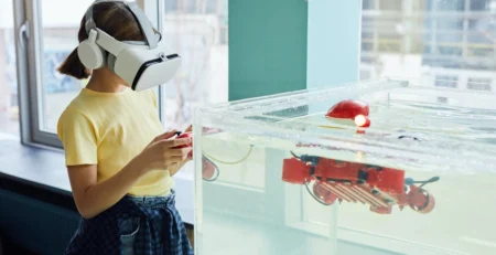 A girl using VR headset testing new device.