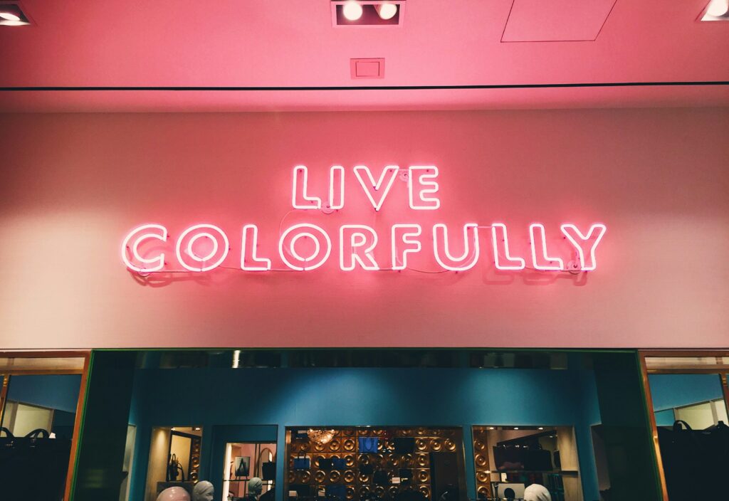 colorful neon logo in a wall