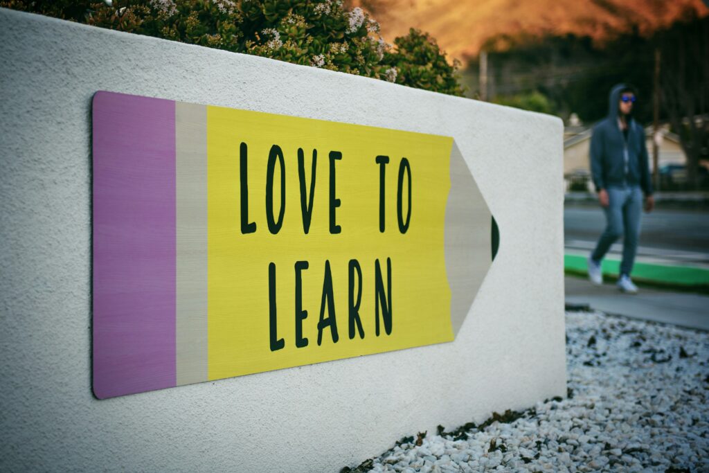 a wall written love to learn